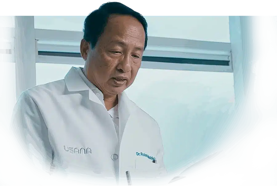 USANA Doctor Reviewing Notes in Clinical Setting